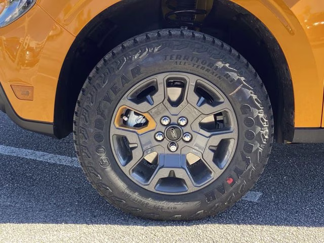 2026 Orange Fury Metallic Tri-Coat Ford Maverick Tremor AWD Truck
