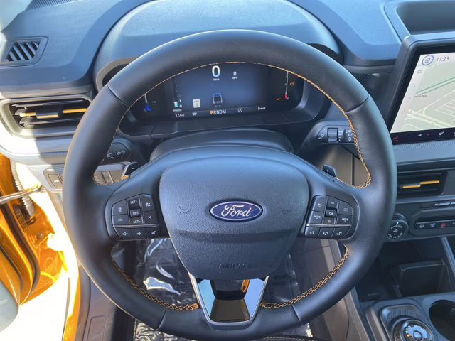 2026 Orange Fury Metallic Tri-Coat Ford Maverick Tremor AWD Truck