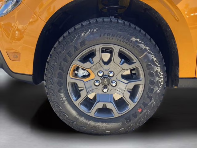 2026 Orange Fury Metallic Tri-Coat Ford Maverick Tremor AWD Truck