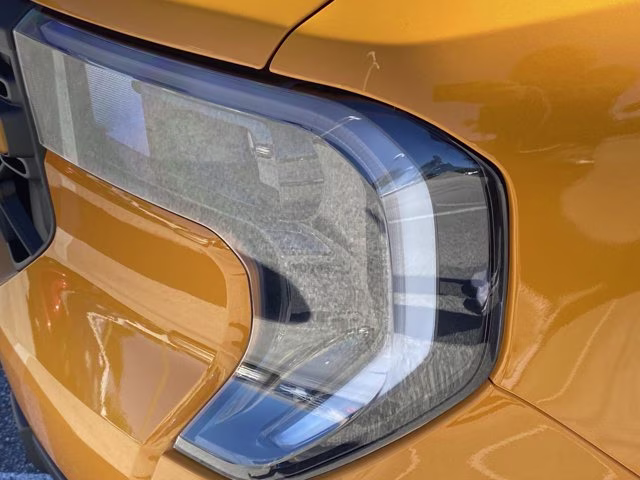 2026 Orange Fury Metallic Tri-Coat Ford Maverick Tremor AWD Truck