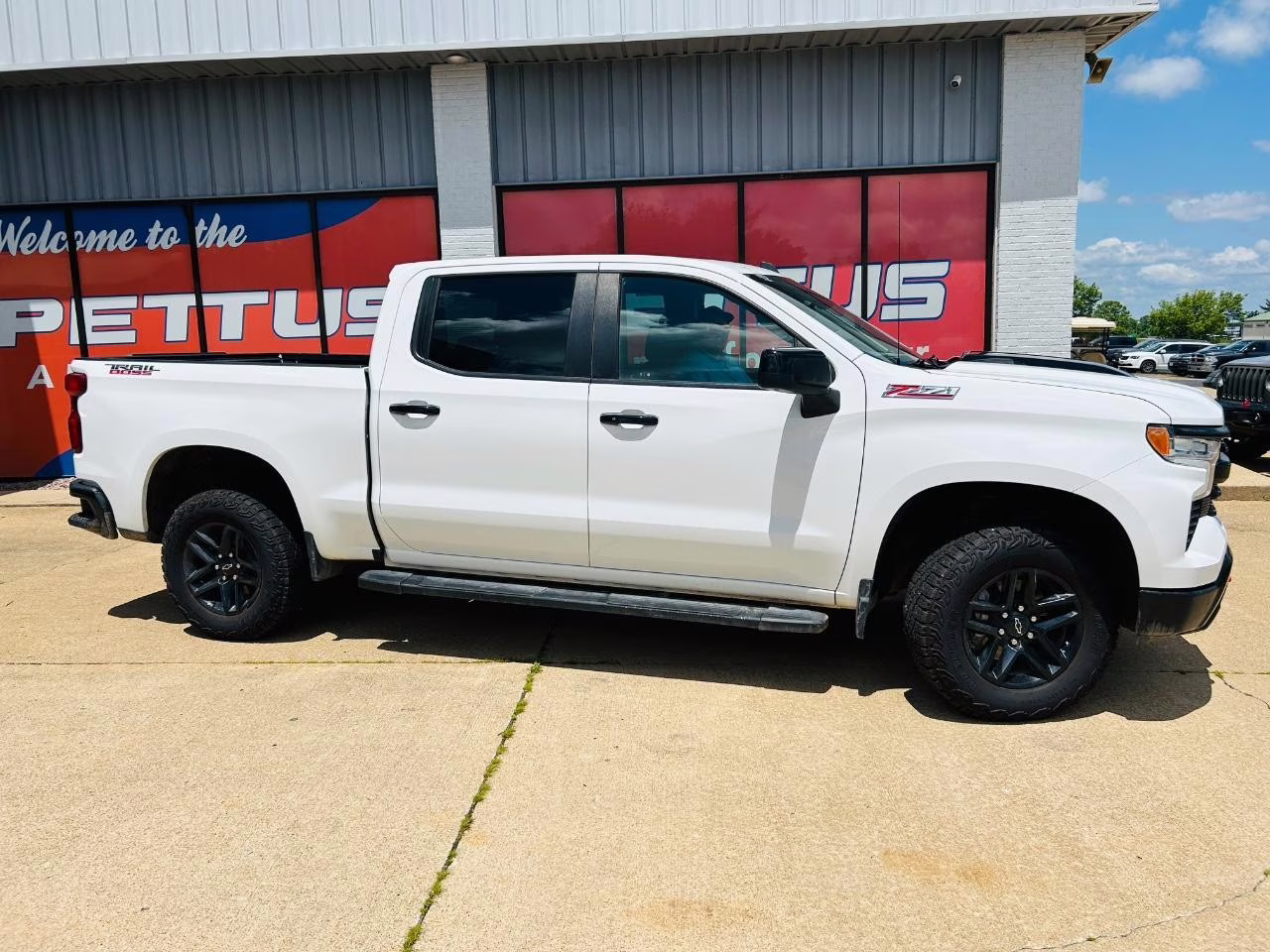 2023 Summit White Chevrolet Silverado 1500 LT Trail Boss 4X4 Truck