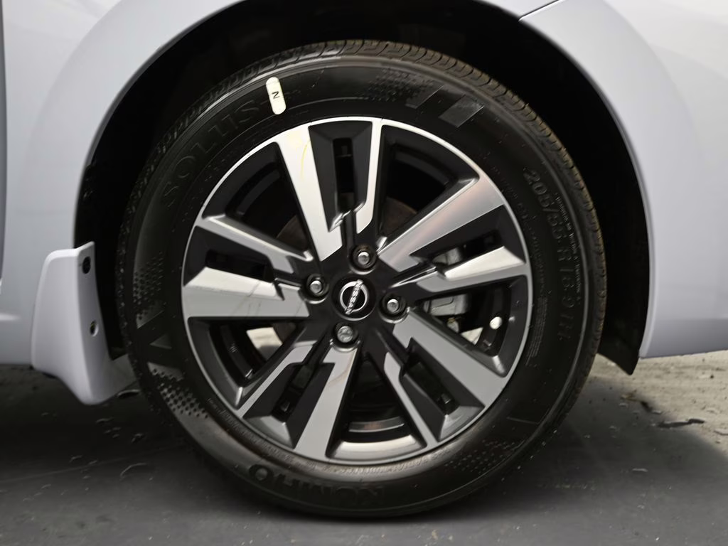 2025 Gray Sky Pearl Nissan Versa 1.6 SV FWD Sedan