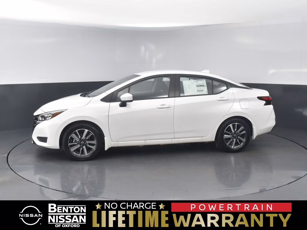 2025 Aspen White Tricoat Nissan Versa 1.6 SV FWD Sedan