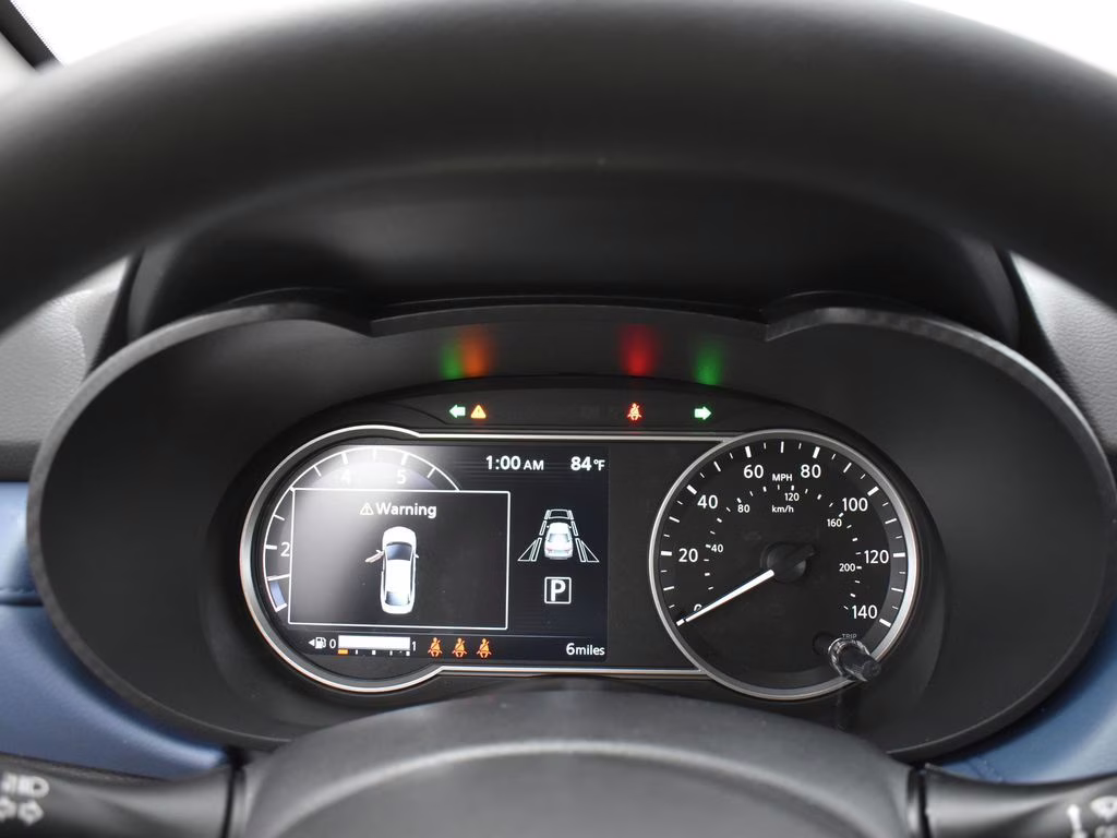 2025 Aspen White Tricoat Nissan Versa 1.6 SV FWD Sedan