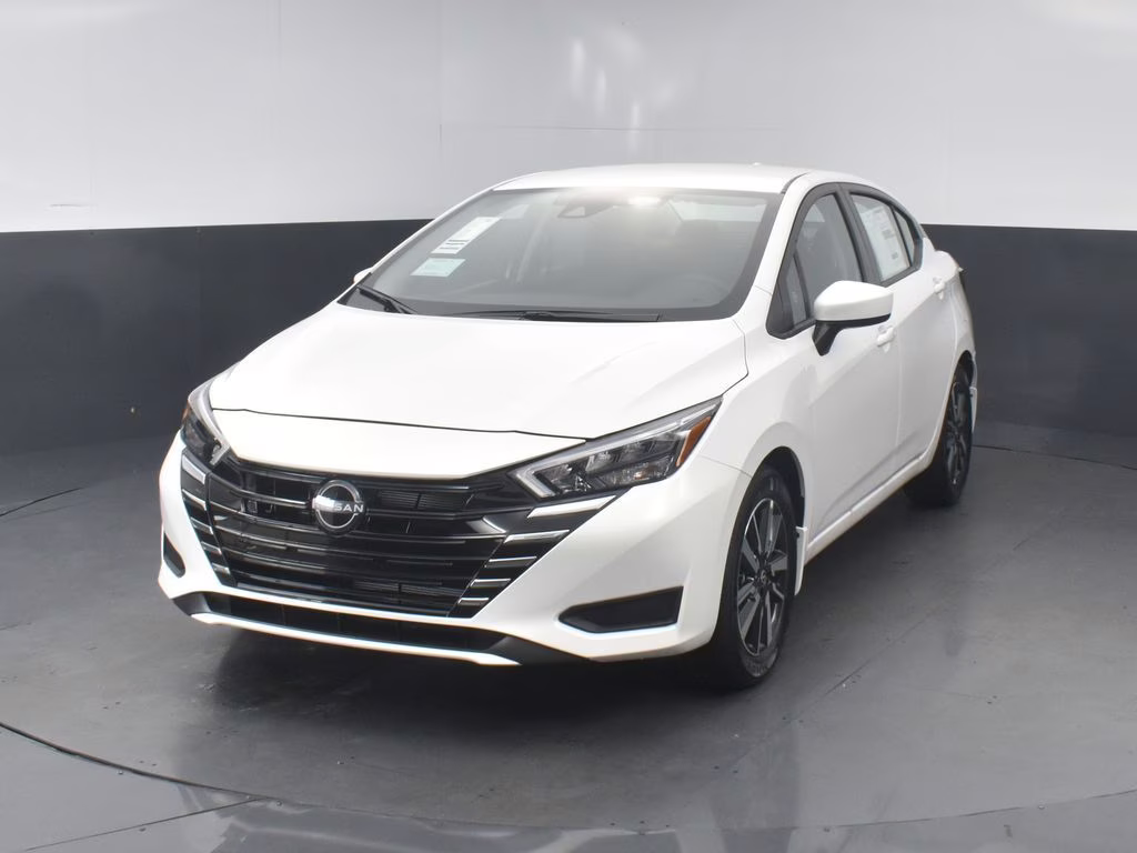 2025 Aspen White Tricoat Nissan Versa 1.6 SV FWD Sedan