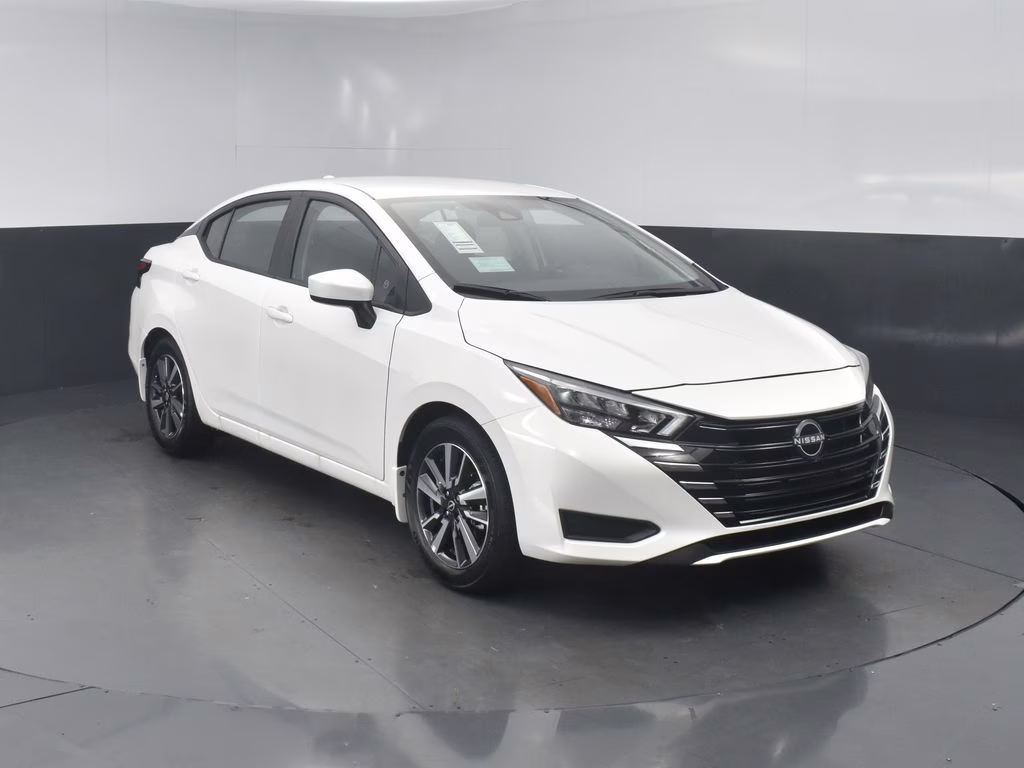 2025 Aspen White Tricoat Nissan Versa 1.6 SV FWD Sedan