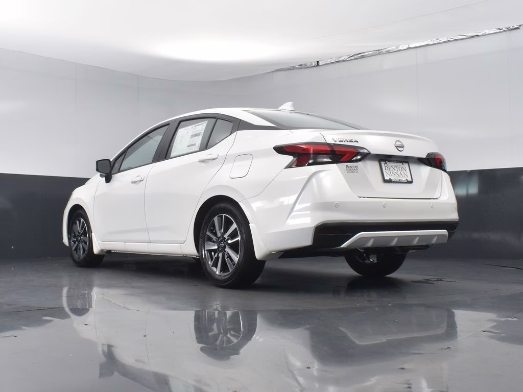 2025 Aspen White Tricoat Nissan Versa 1.6 SV FWD Sedan