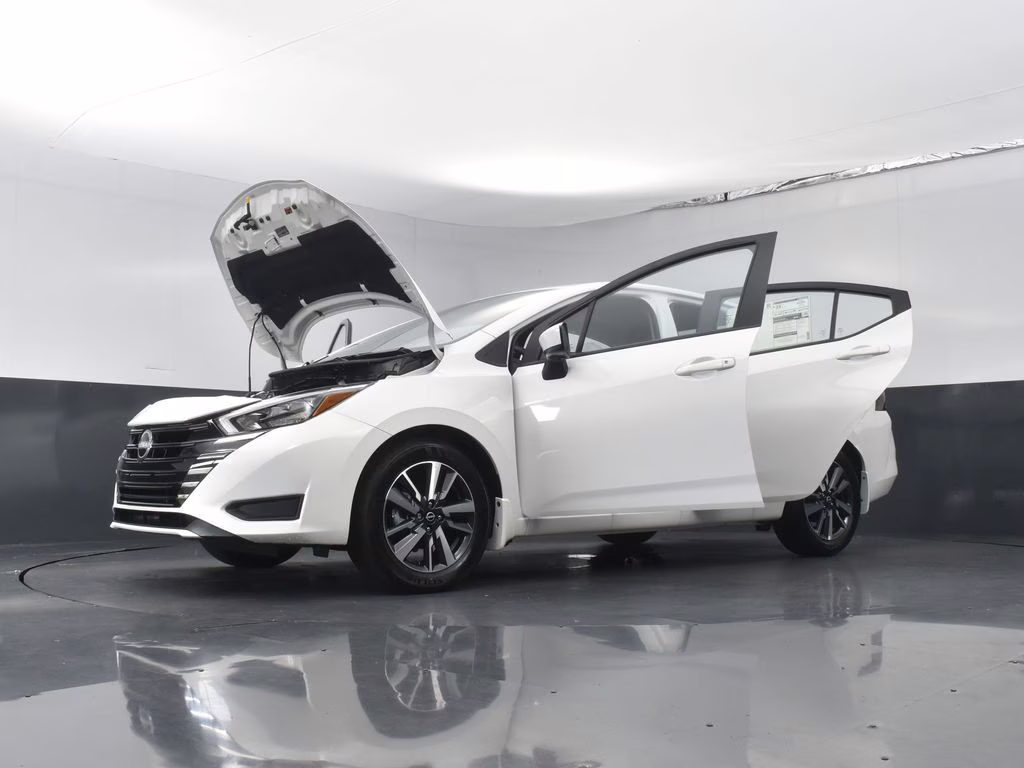 2025 Aspen White Tricoat Nissan Versa 1.6 SV FWD Sedan