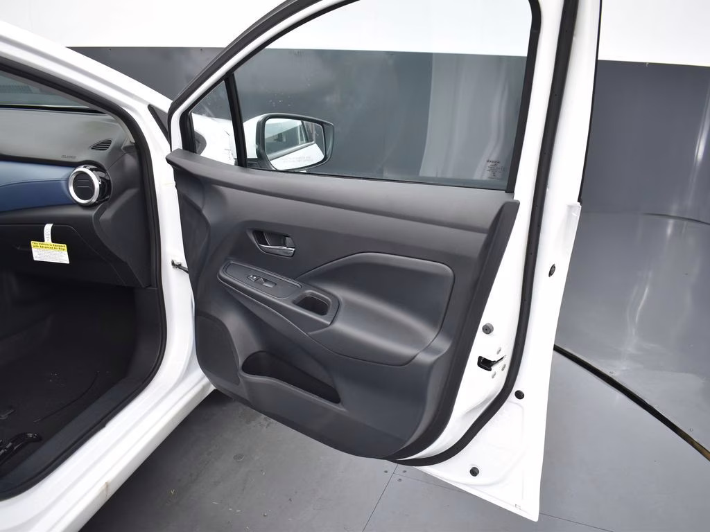 2025 Aspen White Tricoat Nissan Versa 1.6 SV FWD Sedan