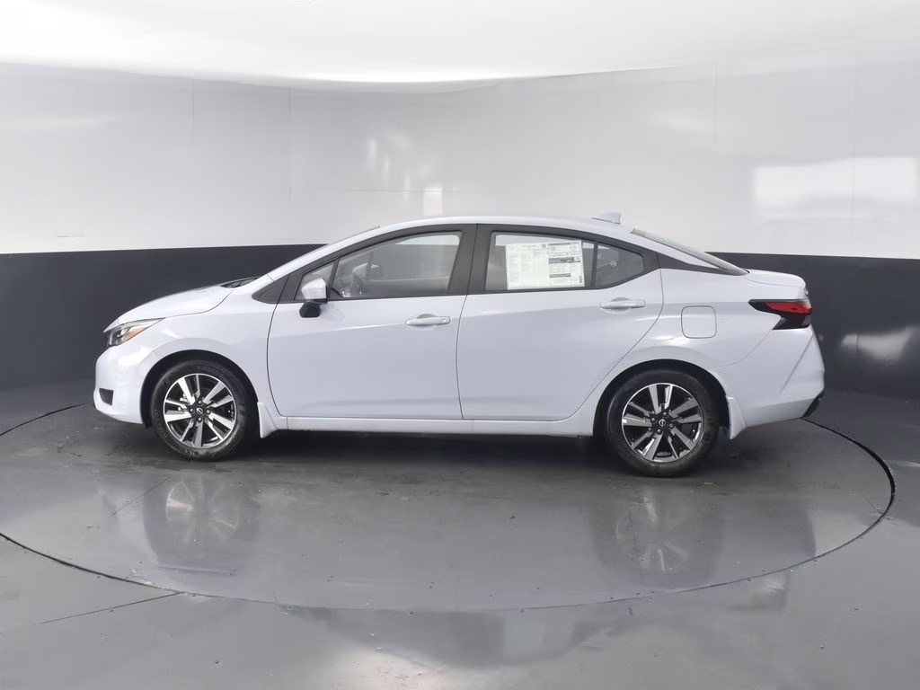 2025 Gray Sky Pearl Nissan Versa 1.6 SV FWD Sedan