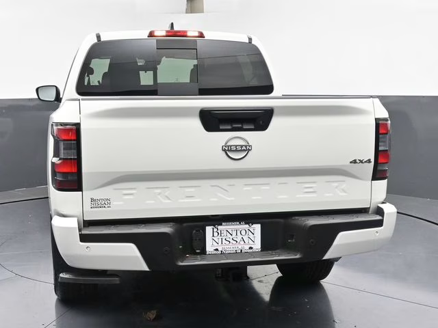 2026 Glacier White Nissan Frontier SV 4X4 Truck