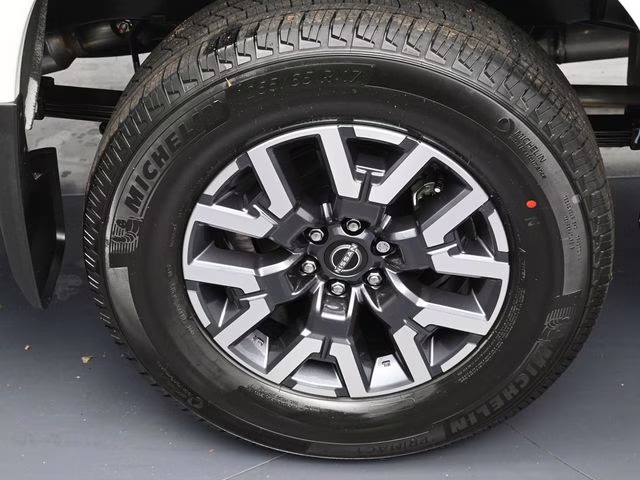 2026 Glacier White Nissan Frontier SV 4X4 Truck