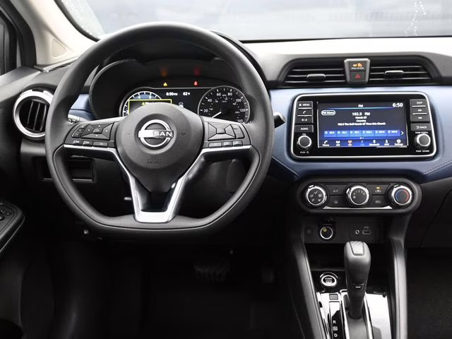 2025 Aspen White Tricoat Nissan Versa 1.6 SV FWD Sedan