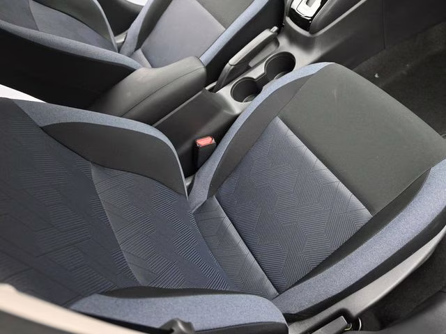 2025 Aspen White Tricoat Nissan Versa 1.6 SV FWD Sedan