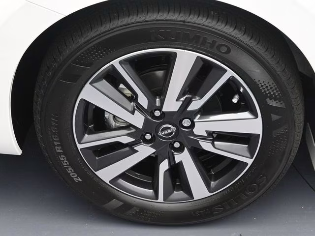 2025 Aspen White Tricoat Nissan Versa 1.6 SV FWD Sedan