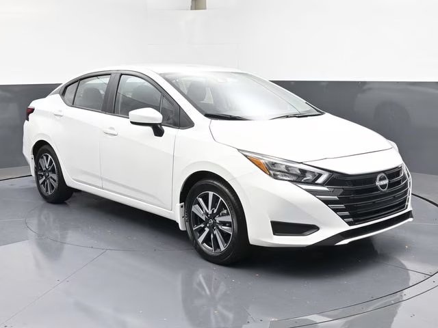2025 Aspen White Tricoat Nissan Versa 1.6 SV FWD Sedan