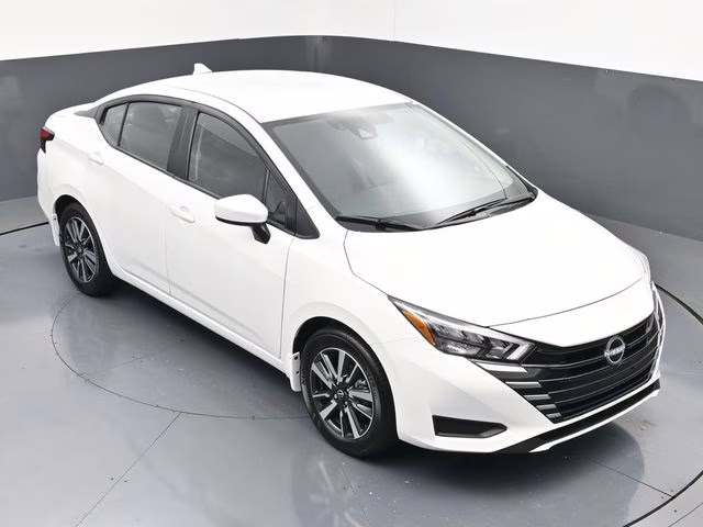 2025 Aspen White Tricoat Nissan Versa 1.6 SV FWD Sedan