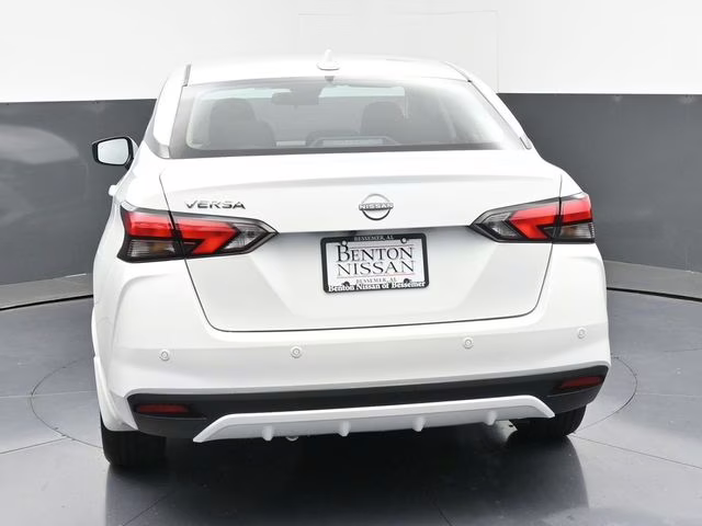 2025 Aspen White Tricoat Nissan Versa 1.6 SV FWD Sedan