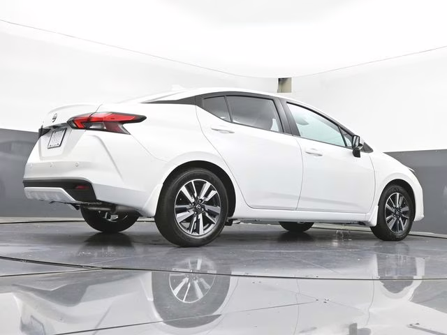 2025 Aspen White Tricoat Nissan Versa 1.6 SV FWD Sedan