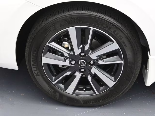 2025 Aspen White Tricoat Nissan Versa 1.6 SV FWD Sedan