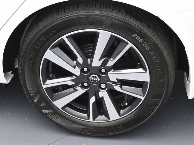 2025 Aspen White Tricoat Nissan Versa 1.6 SV FWD Sedan