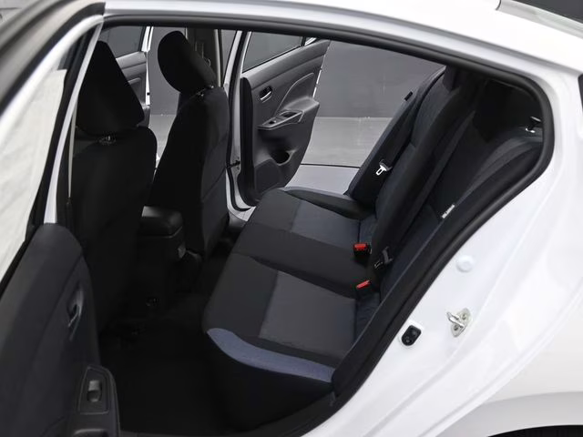 2025 Aspen White Tricoat Nissan Versa 1.6 SV FWD Sedan