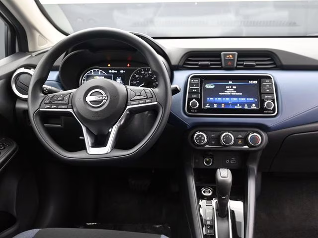 2025 Aspen White Tricoat Nissan Versa 1.6 SV FWD Sedan