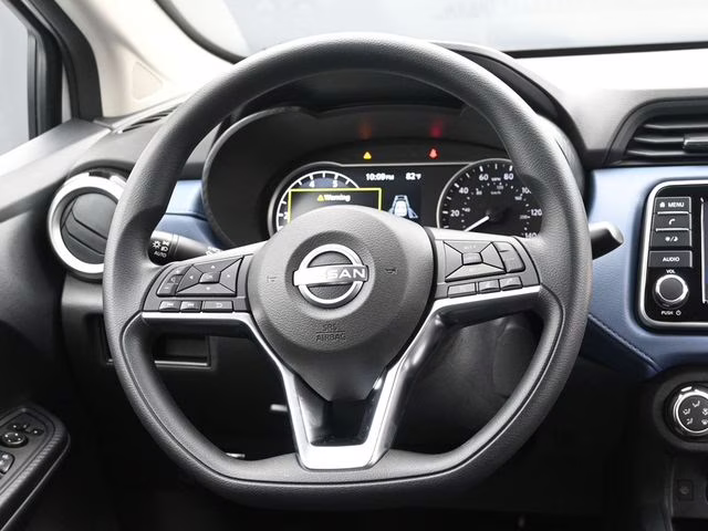 2025 Aspen White Tricoat Nissan Versa 1.6 SV FWD Sedan