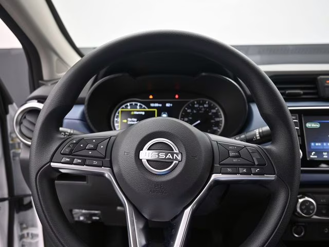 2025 Aspen White Tricoat Nissan Versa 1.6 SV FWD Sedan