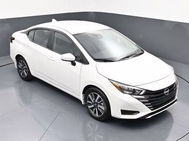 2025 Aspen White Tricoat Nissan Versa 1.6 SV FWD Sedan