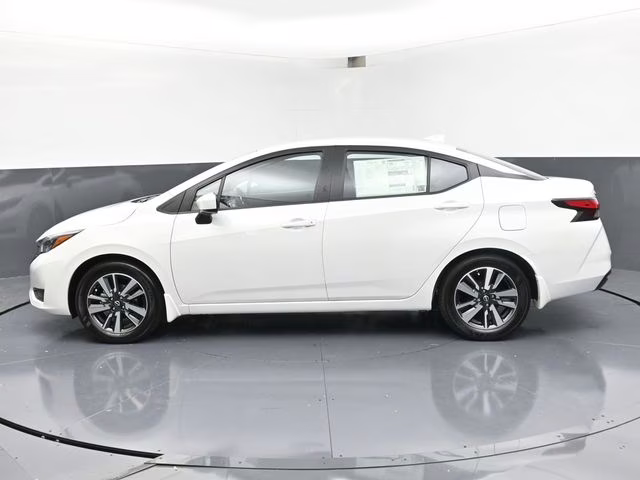2025 Aspen White Tricoat Nissan Versa 1.6 SV FWD Sedan