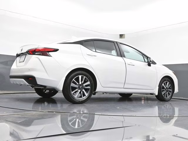 2025 Aspen White Tricoat Nissan Versa 1.6 SV FWD Sedan