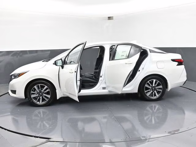 2025 Aspen White Tricoat Nissan Versa 1.6 SV FWD Sedan