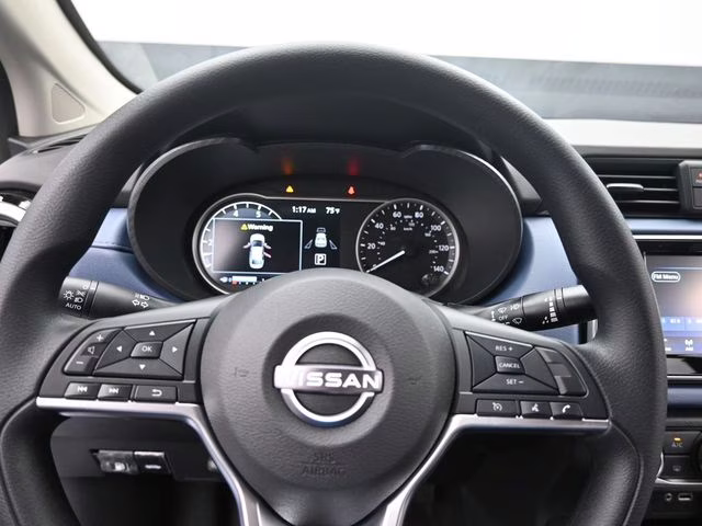 2025 Gray Sky Pearl Nissan Versa 1.6 SV FWD Sedan