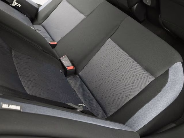 2025 Aspen White Tricoat Nissan Versa 1.6 SV FWD Sedan