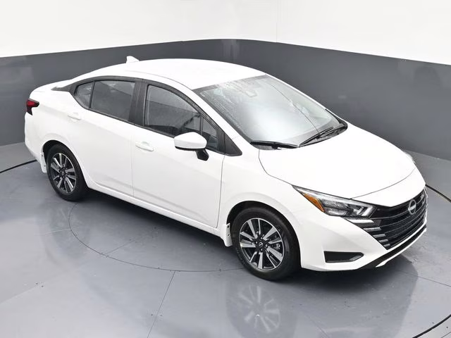 2025 Aspen White Tricoat Nissan Versa 1.6 SV FWD Sedan