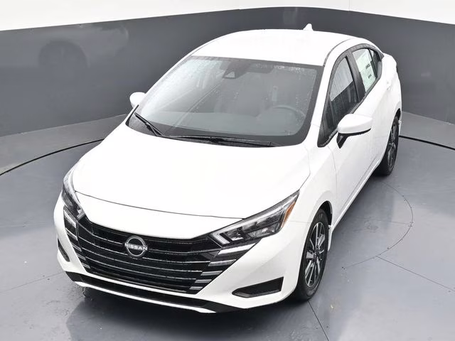 2025 Aspen White Tricoat Nissan Versa 1.6 SV FWD Sedan