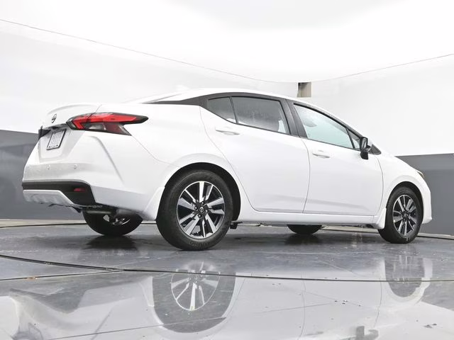 2025 Aspen White Tricoat Nissan Versa 1.6 SV FWD Sedan