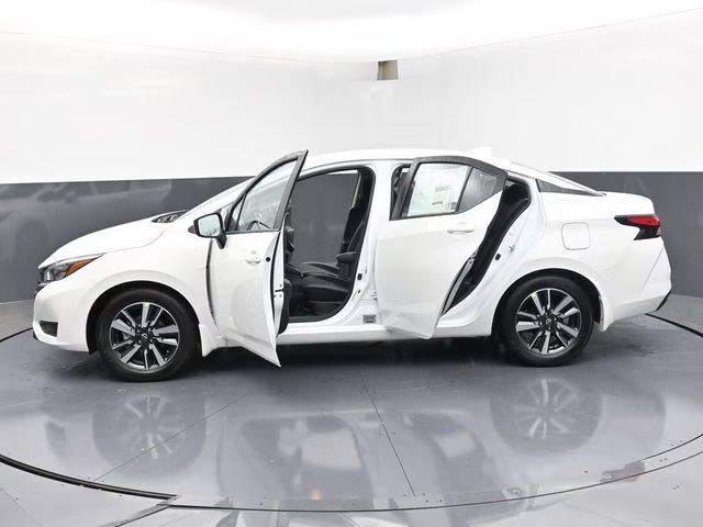 2025 Aspen White Tricoat Nissan Versa 1.6 SV FWD Sedan