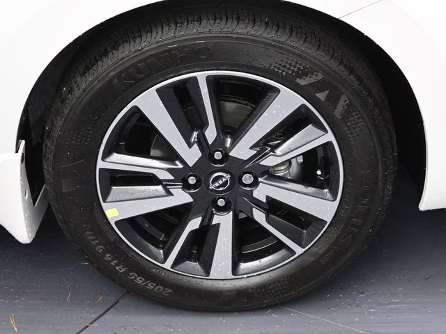 2025 Aspen White Tricoat Nissan Versa 1.6 SV FWD Sedan