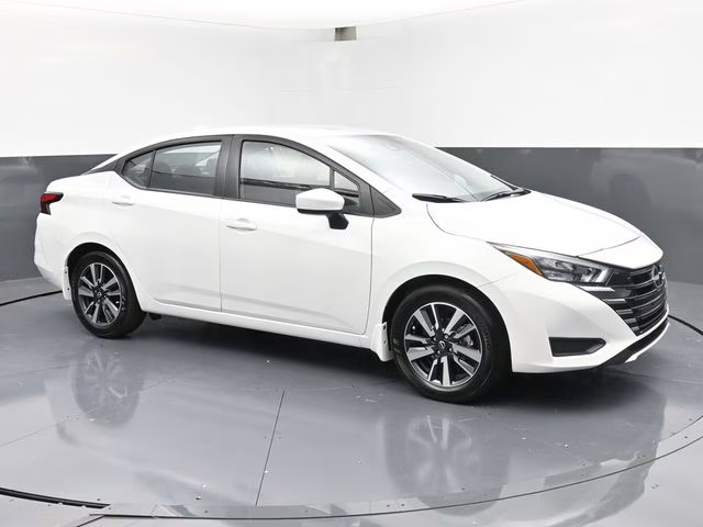 2025 Aspen White Tricoat Nissan Versa 1.6 SV FWD Sedan