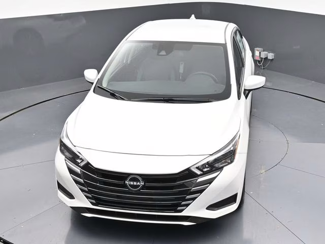2025 Aspen White Tricoat Nissan Versa 1.6 SV FWD Sedan