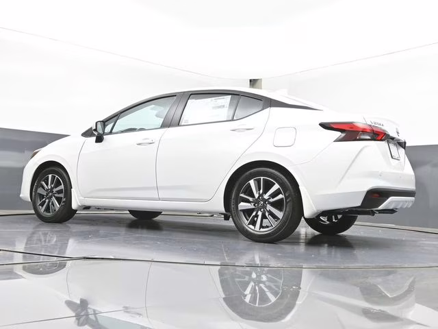 2025 Aspen White Tricoat Nissan Versa 1.6 SV FWD Sedan
