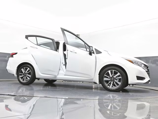 2025 Aspen White Tricoat Nissan Versa 1.6 SV FWD Sedan