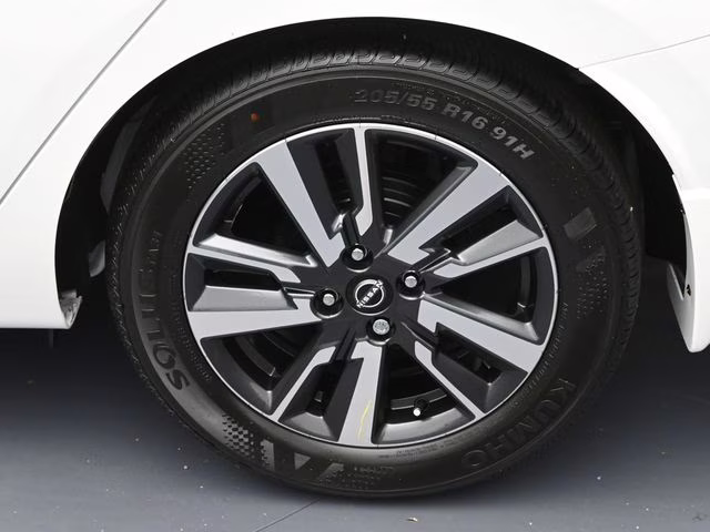 2025 Aspen White Tricoat Nissan Versa 1.6 SV FWD Sedan