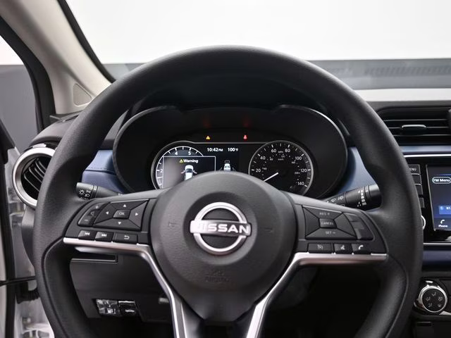 2025 Aspen White Tricoat Nissan Versa 1.6 SV FWD Sedan