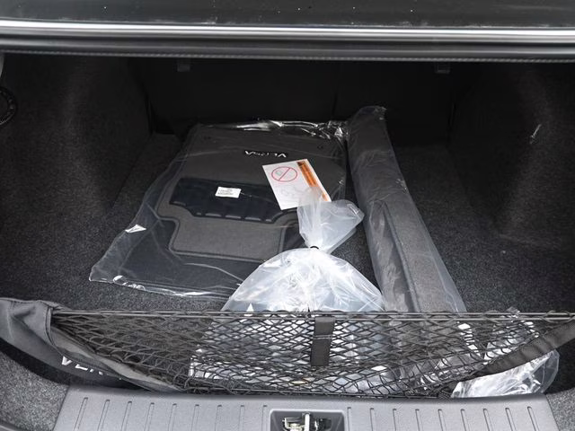 2025 Aspen White Tricoat Nissan Versa 1.6 SV FWD Sedan