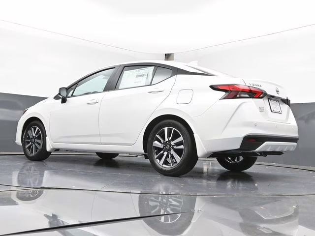 2025 Aspen White Tricoat Nissan Versa 1.6 SV FWD Sedan