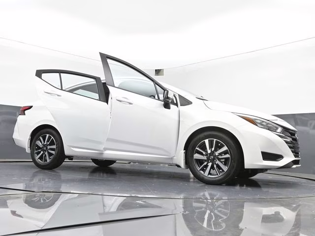 2025 Aspen White Tricoat Nissan Versa 1.6 SV FWD Sedan