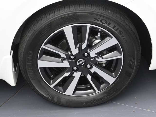 2025 Aspen White Tricoat Nissan Versa 1.6 SV FWD Sedan